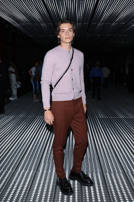 Louis Partridge attends the Prada Spring/Summer 2024 Menswear Fashion Show