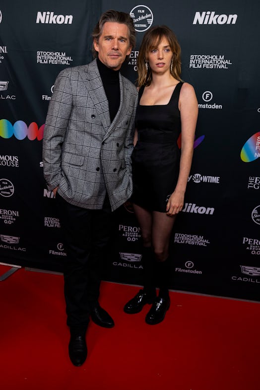 Ethan Hawke and Maya Hawke pose on the red carpet during a ceremony for the Stockholm Film Festival'...