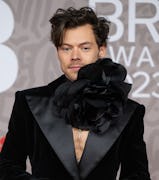 Harry Styles' new shaved head has fans mourning the loss of his signature hair.