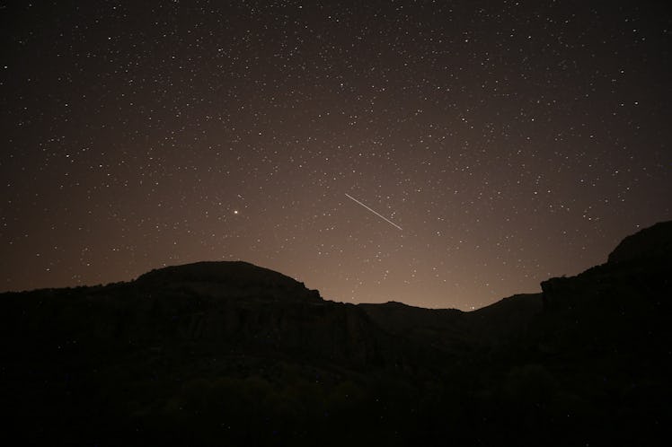 ANKARA,TURKEY - NOVEMBER 17: Leonids meteor streaks across the sky over Gudul district of Ankara, Tu...