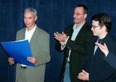 NEW YORK, UNITED STATES:  Director of the movie Godzilla, Roland Emmerich (L), holds a proclamation ...