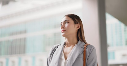 asian business woman feel depressed and looking far away