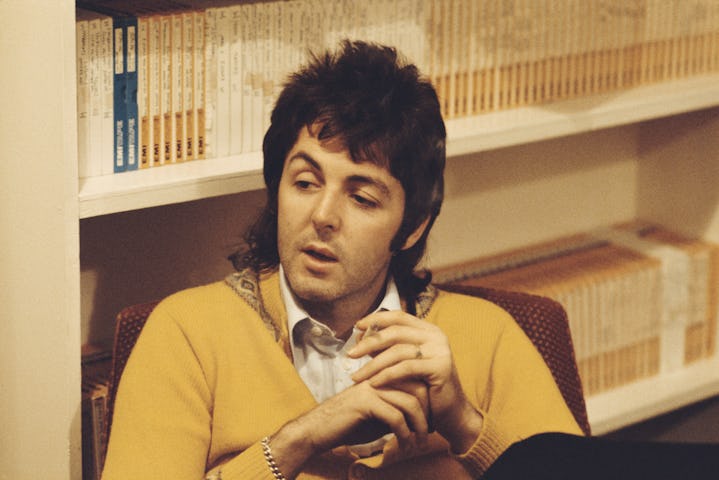 Singer-songwriter Paul McCartney of British rock group Wings, pictured smoking a cigarette in an off...