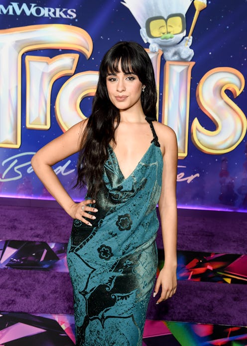 Camila Cabello wears a teal archival halter dress at the special screening of "Trolls Band Together....