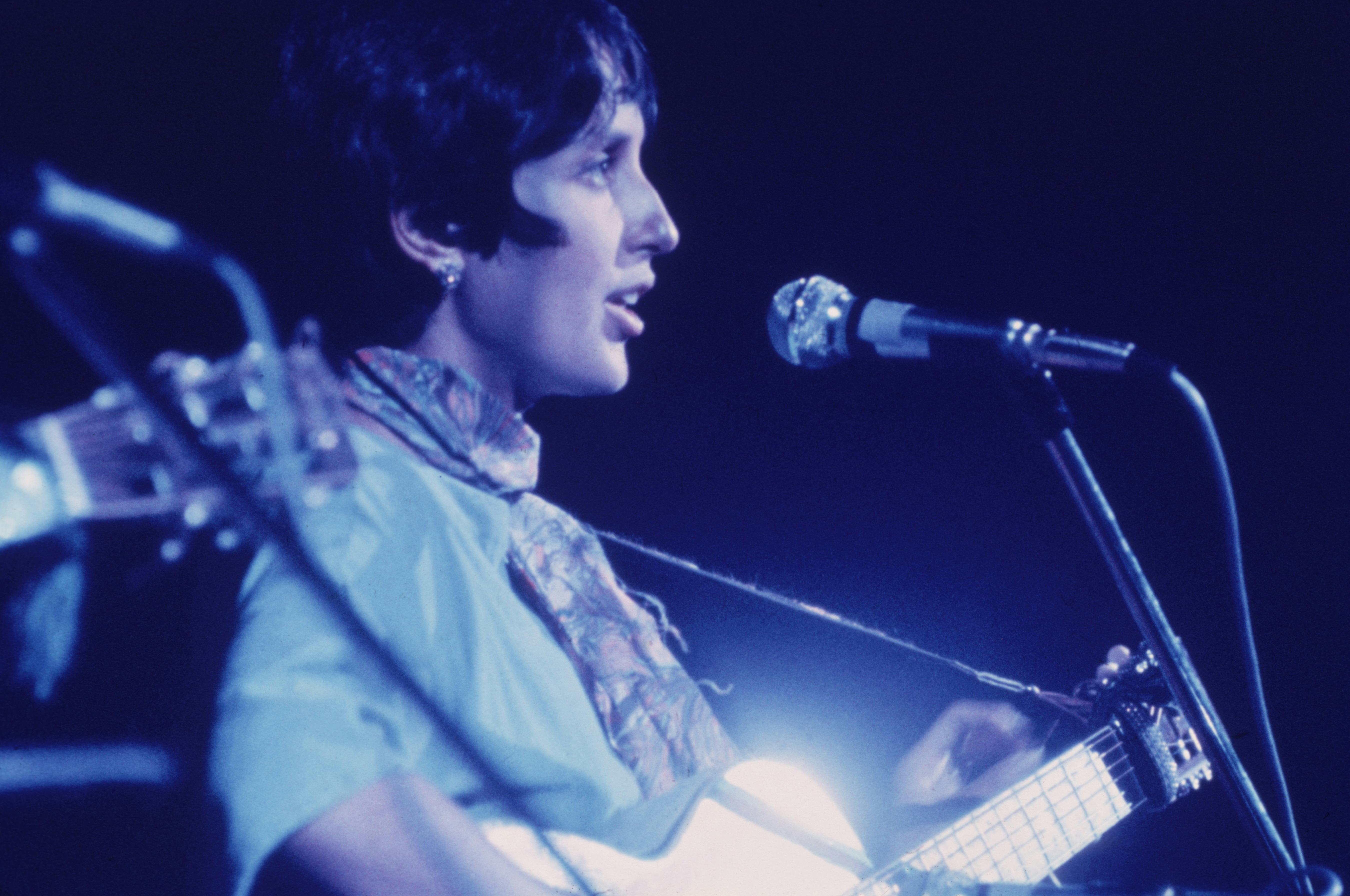 American folk singer Joan Baez performed at Woodstock 1969.