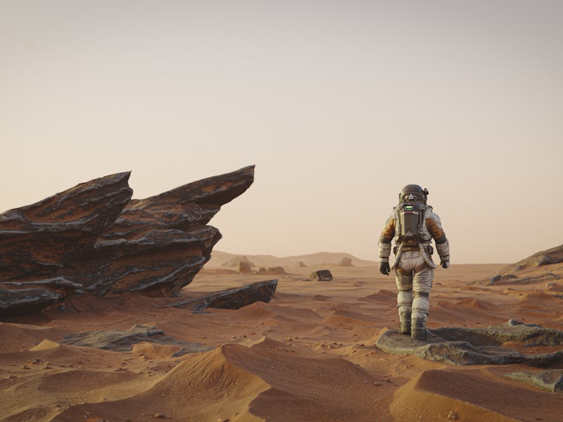 An astronaut exploring another world