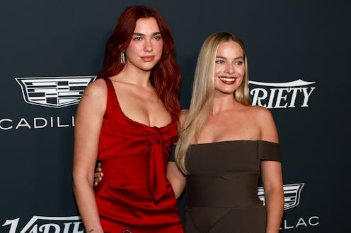 LOS ANGELES, CALIFORNIA - NOVEMBER 16: Dua Lipa and Margot Robbie attend the 2023 Variety Power Of W...