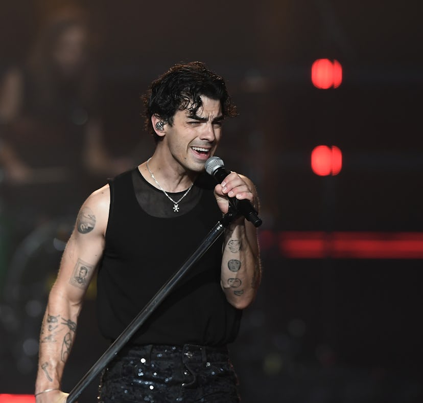 Joe Jonas performing on Jonas Brothers tour