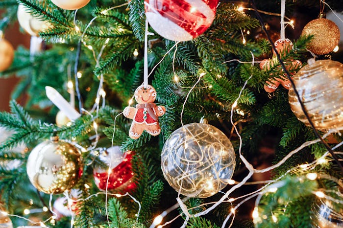 Christmas tree decorative ball with glitter and sparkles. New Year decor creative concept. Christmas...