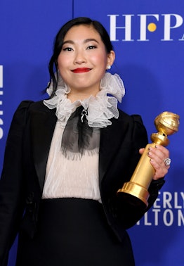 Awkwafina black tip French manicure at 2020 Golden Globes