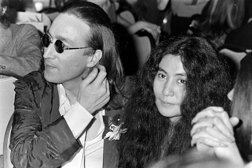 John Lennon (L) and Yoko Ono attend an Academy of Television Arts and Sciences dinner at the Hilton ...