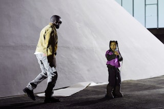 Kanye West and North West on the catwalk (Photo by WWD/Penske Media via Getty Images)