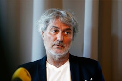 Italian surgeon Dr. Paolo Macchiarini (C) speaks during a press conference with as his Defence Attor...
