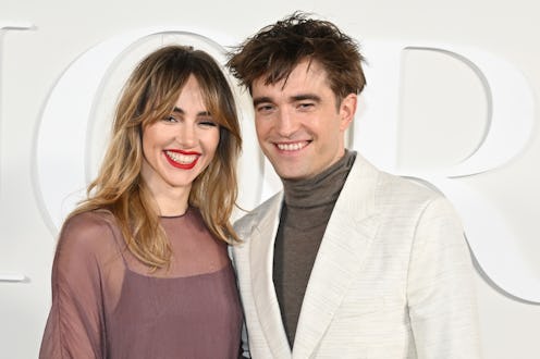 Suki Waterhouse and Robert Pattinson on the red carpet.