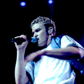 Justin Timberlake of the music group N'Sync perform on stage at the Rosemont Horizon in Rosemont, Il...
