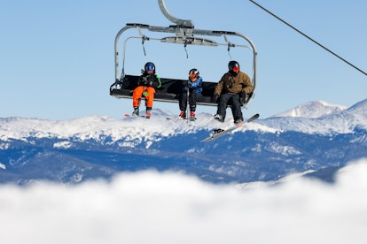 BRECKENRIDGE, CO - NOVEMBER 13: People ride up the mountain on a chair lift on opening day at Brecke...