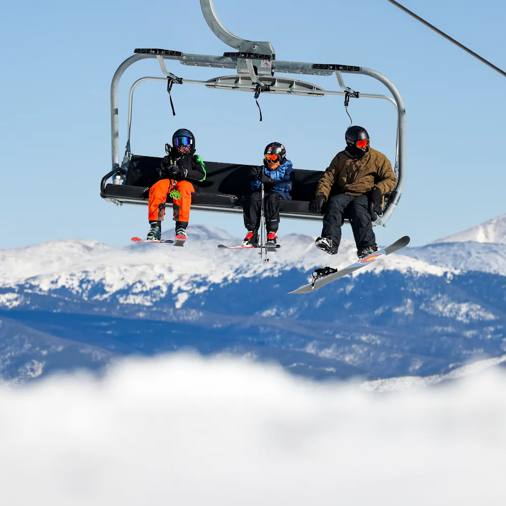 BRECKENRIDGE, CO - NOVEMBER 13: People ride up the mountain on a chair lift on opening day at Brecke...
