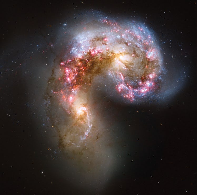 Antennae Galaxy, The Antennae Galaxies Colliding. (Photo By Encyclopaedia Britannica/UIG Via Getty I...
