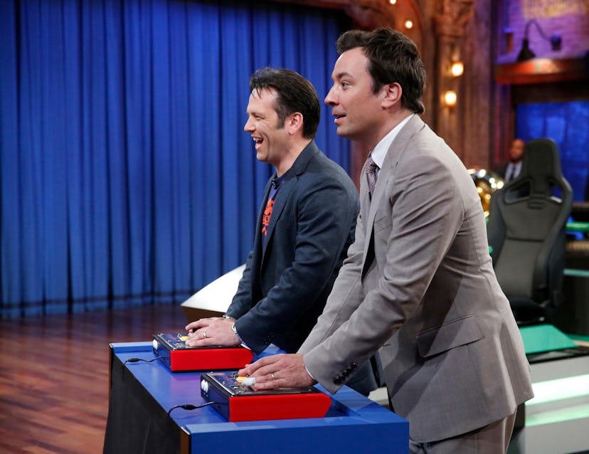LATE NIGHT WITH JIMMY FALLON -- Episode 854 -- Pictured: (l-r) Xbox Rep Phil Spencer with host Jimmy...