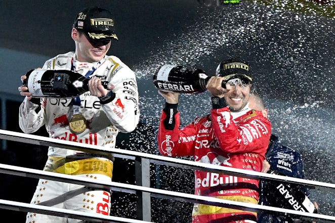 Las Vegas, NV - November 19: Race winner Max Verstappen, left, and third place finisher Sergio Perez...