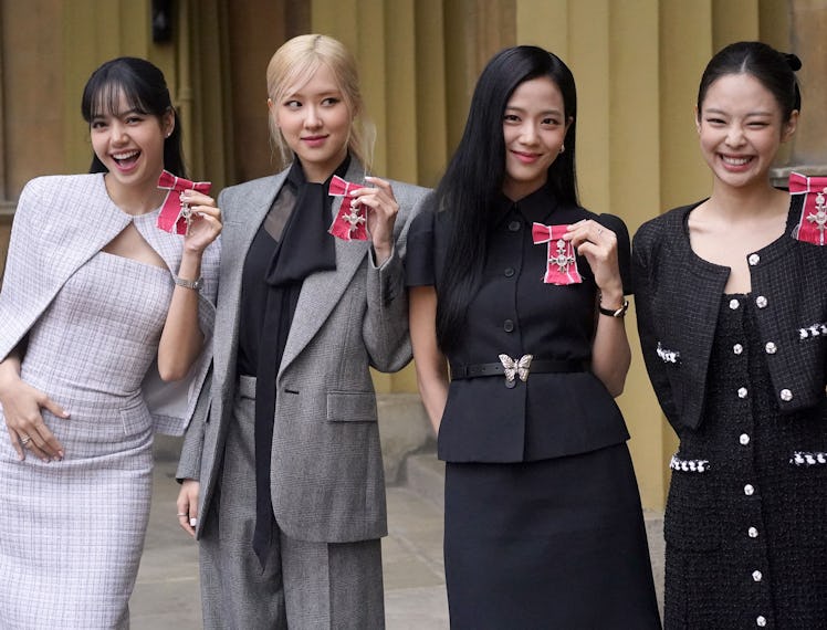 K-Pop band Blackpink's members, Lalisa Manoban, Roseanne Park, Jisoo Kim and Jennie Kim pose with th...
