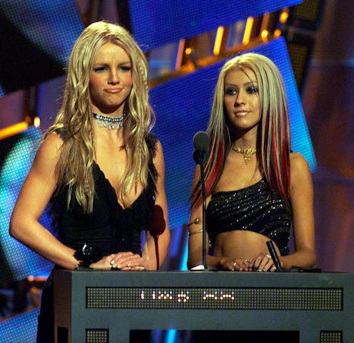 Britney Spears and Christina Aguilera onstage.