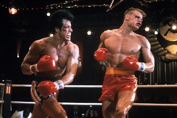Sylvester Stallone punches Dolph Lundgren in a scene from the film 'Rocky IV', 1985. (Photo by Unite...