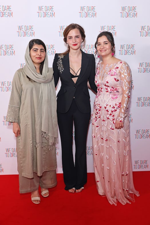 Emma Watson wore a criss-cross bralette under her Alexander McQueen blazer