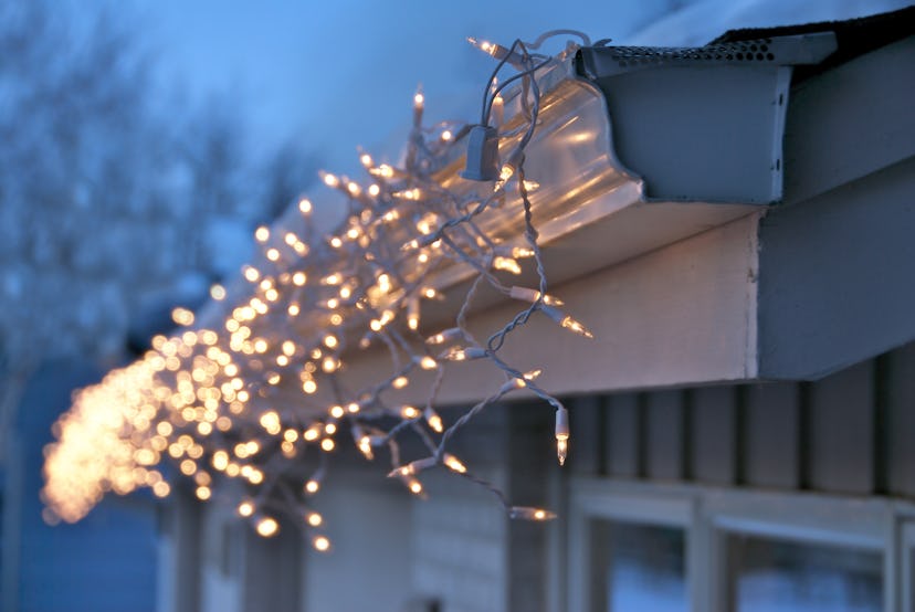 Icicle Christmas lights on gutter, in a story answering the question, is it safe to leave outdoor ch...