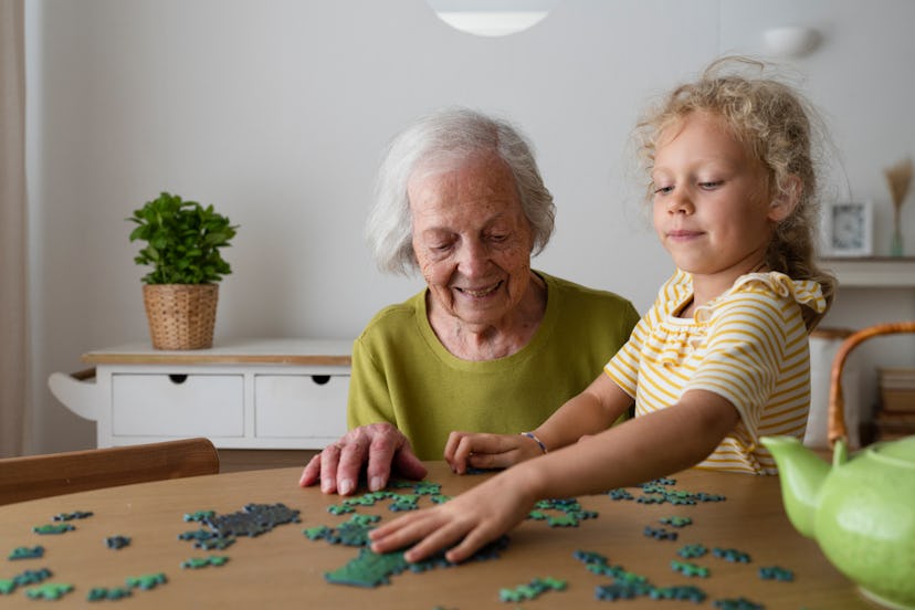 Grandmother and granddaughter do a jigsaw puzzle together, in a story answering the question, how do...
