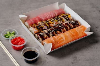 Sushi home delivery, close up. Take out food