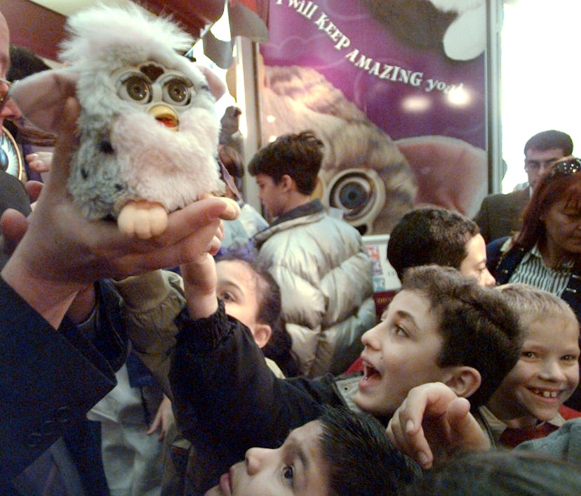 UNITED STATES - OCTOBER 02:  Students from PS 59 meet Furby, a new interactive toy, at FAO Schwarz. ...