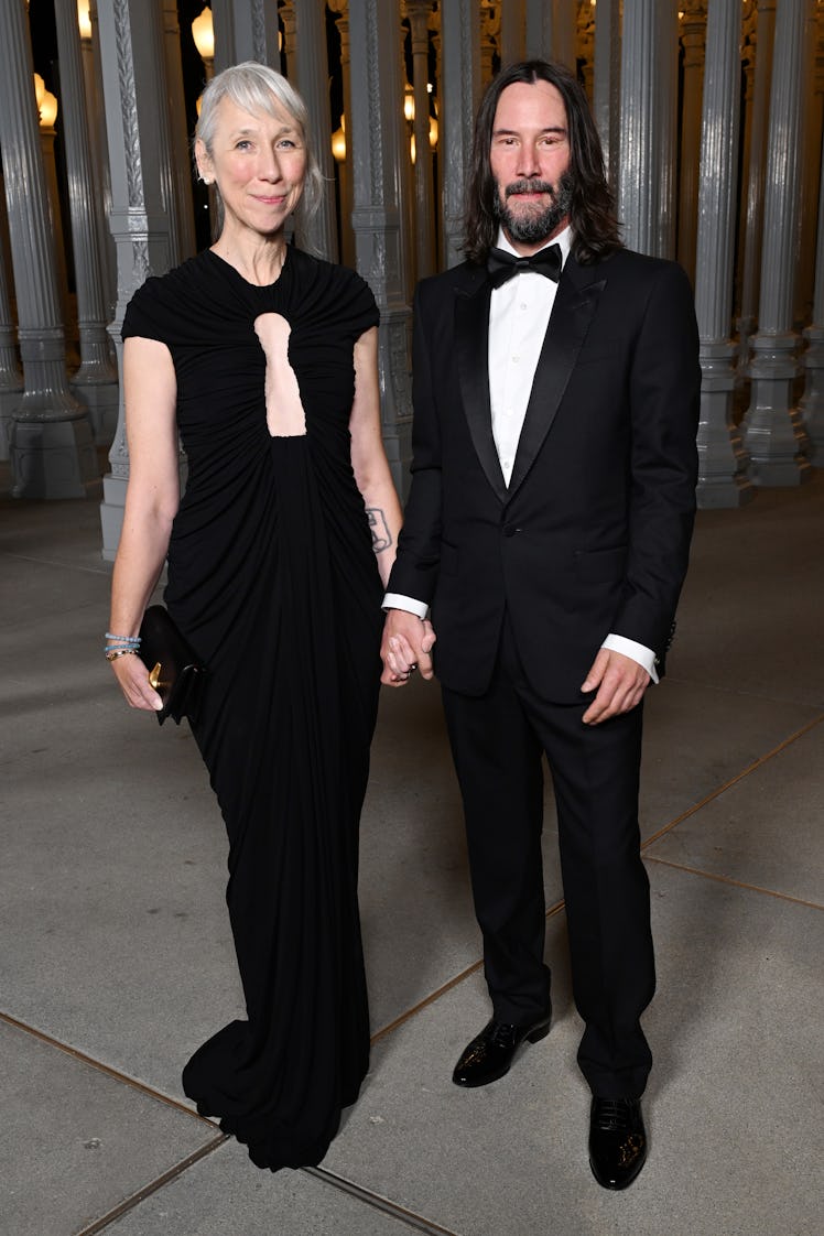 LOS ANGELES, CALIFORNIA - NOVEMBER 04: (L-R) Alexandra Grant and Keanu Reeves, wearing Gucci, attend...