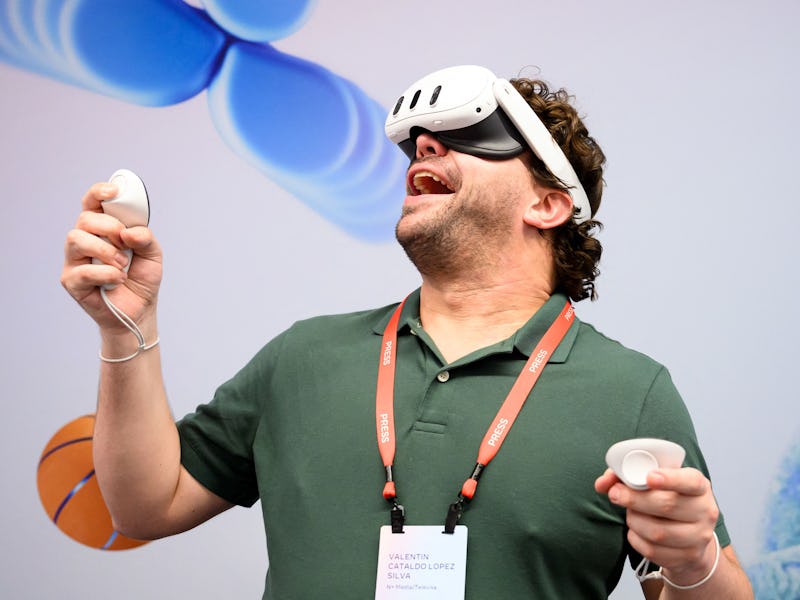 A member of the press tries out a MetaQuest 3 during the Meta Connect Developer Conference at Meta's...