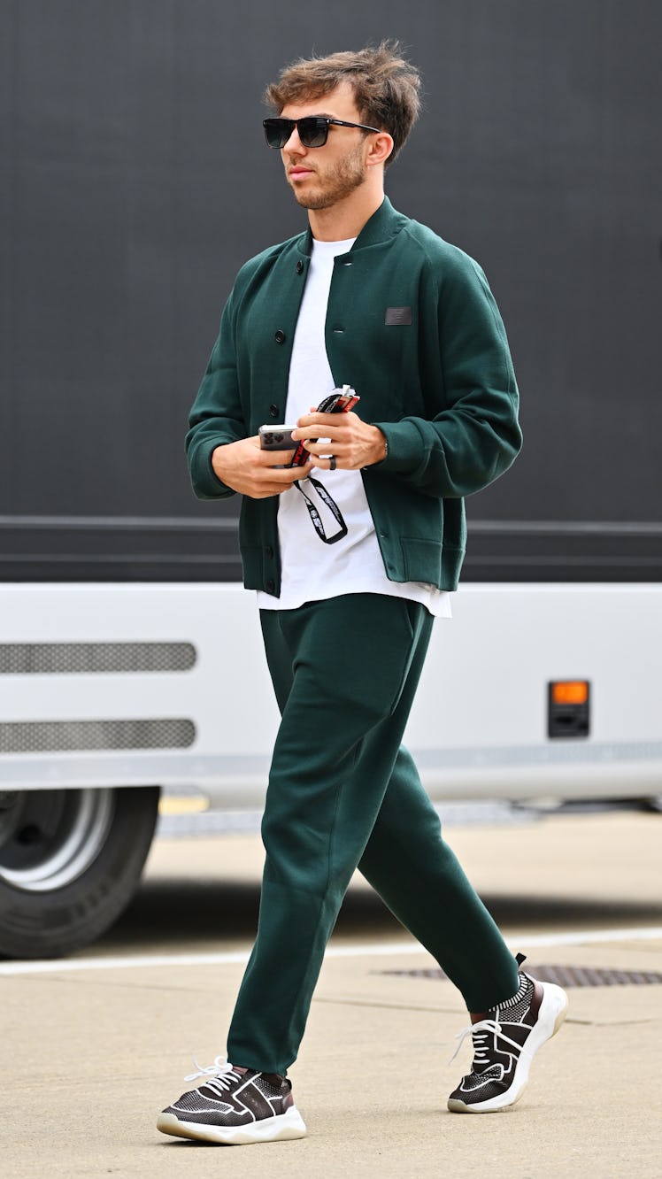 NORTHAMPTON, ENGLAND - JULY 06: Pierre Gasly of France and Alpine F1 walks in the Paddock during pre...