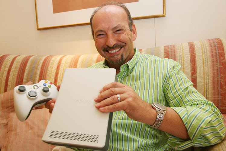 CHIBA, JAPAN - SEPTEMBER 22: Peter Moore, Vice President of Microsoft Corporation shows the Xbox 360...