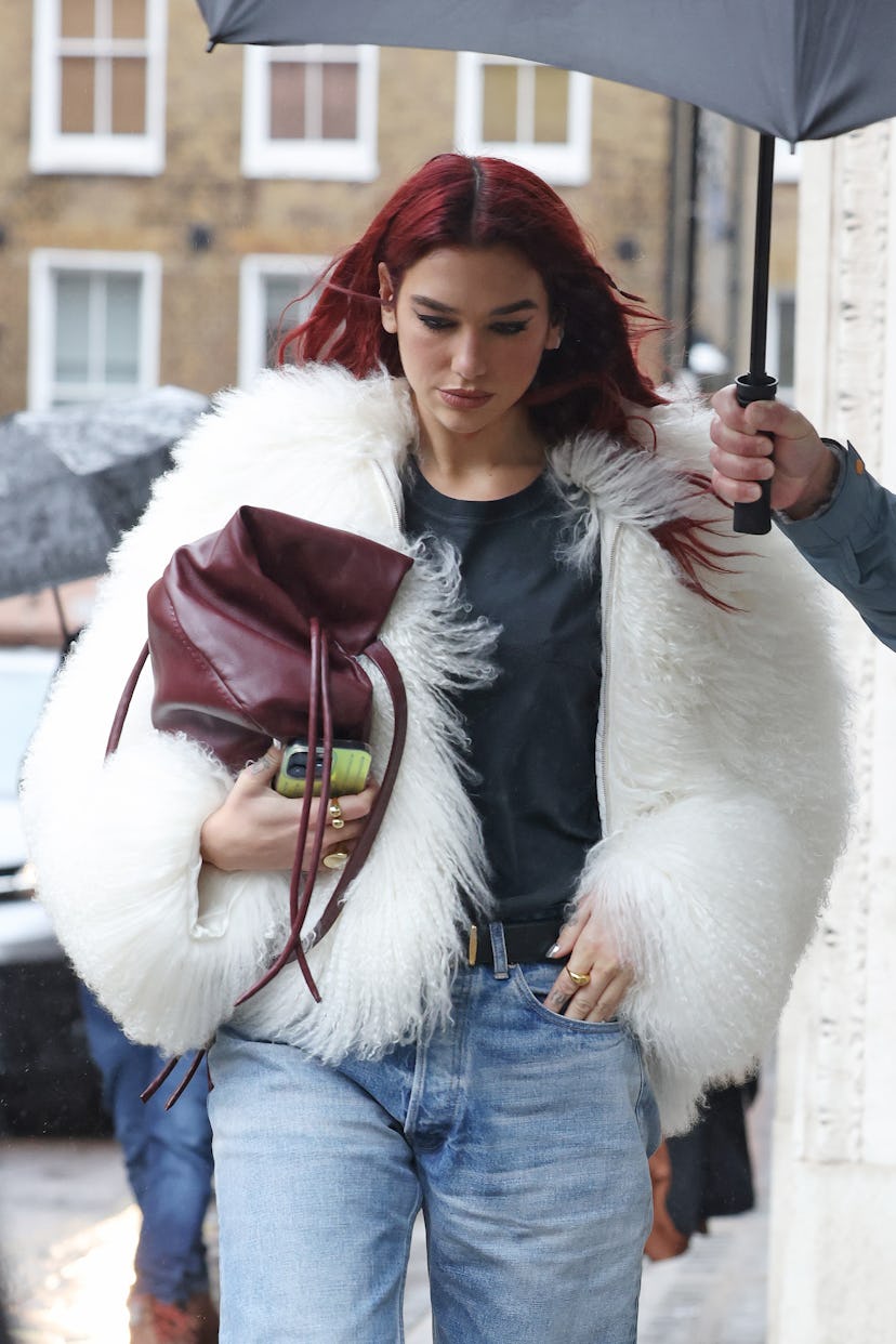 Dua Lipa leaving KISS Radio Studios on November 08, 2023 in London, England.