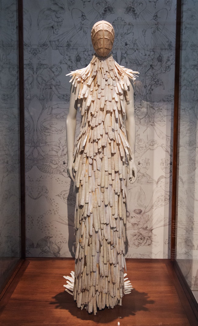 A razor clam shell encrusted dress from the "Voss" Spring/Summer 2001 collection is on display durin...