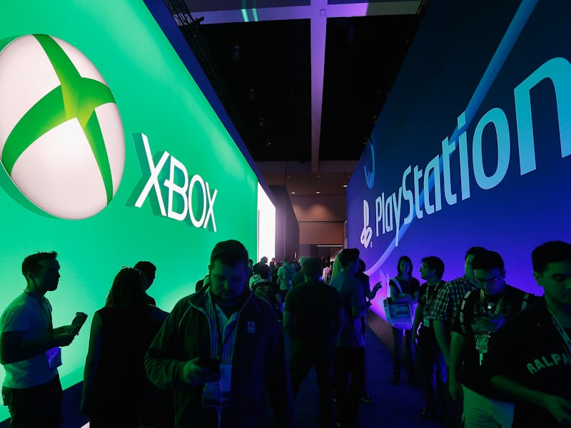 LOS ANGELES, CA - JUNE 16:  Game enthusiasts and industry personnel walk between the Microsoft XBox ...