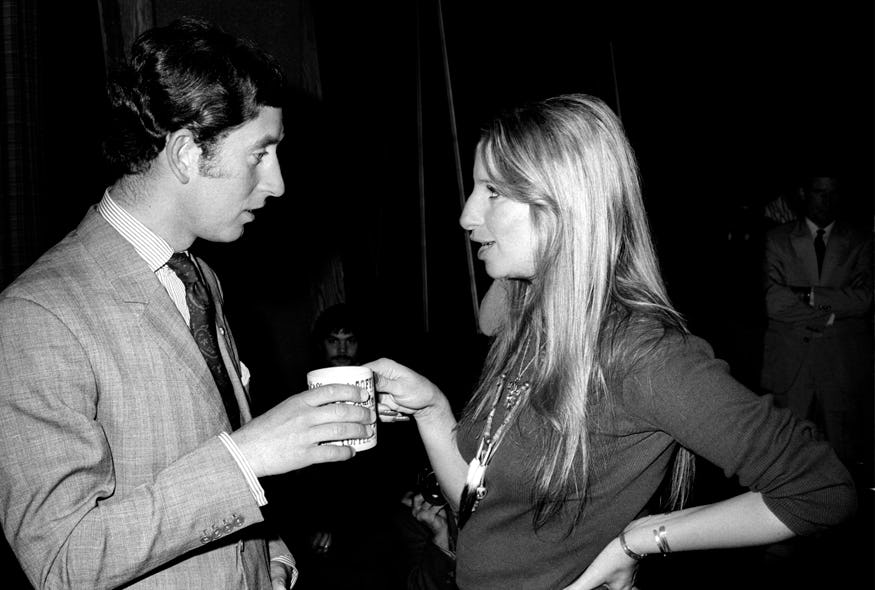 Prince Charles and singer Barbra Streisand meet at Warner Bros. studios.