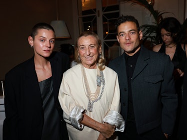 Emma Corrin, Miuccia Prada and Rami Malek attend the Miu Miu Dinner Party at Laurent as part of the ...