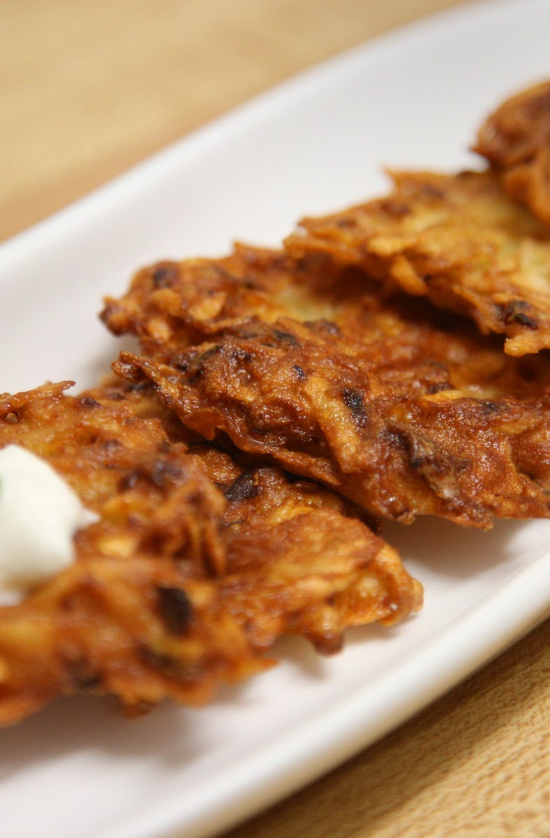 Potato latkes with sour cream in Toronto, Ontario, Canada, on December 20, 2022. A latke is a type o...