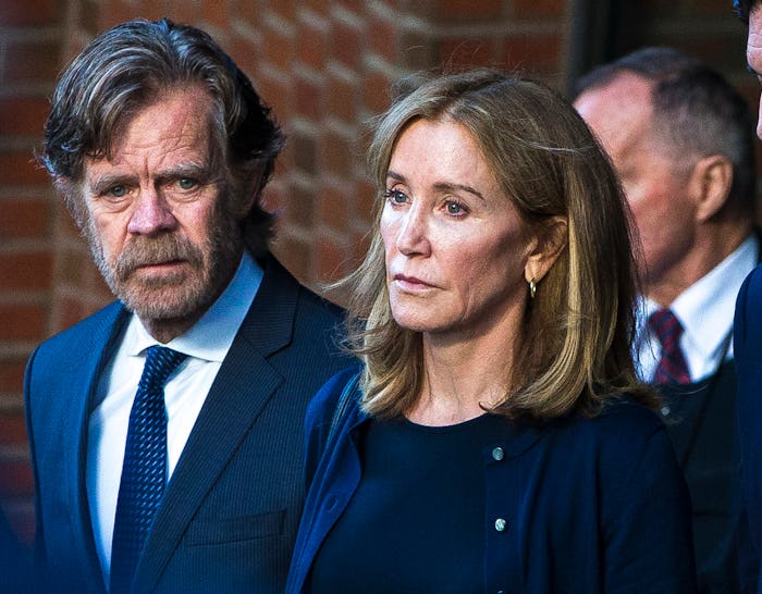 BOSTON, MA - SEPTEMBER 13: Felicity Huffman, right, and her husband, William H. Macy, walk out of th...