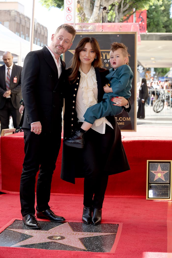 HOLLYWOOD, CALIFORNIA - DECEMBER 01: (L-R) Macaulay Culkin, Brenda Song and Dakota Song Culkin atten...