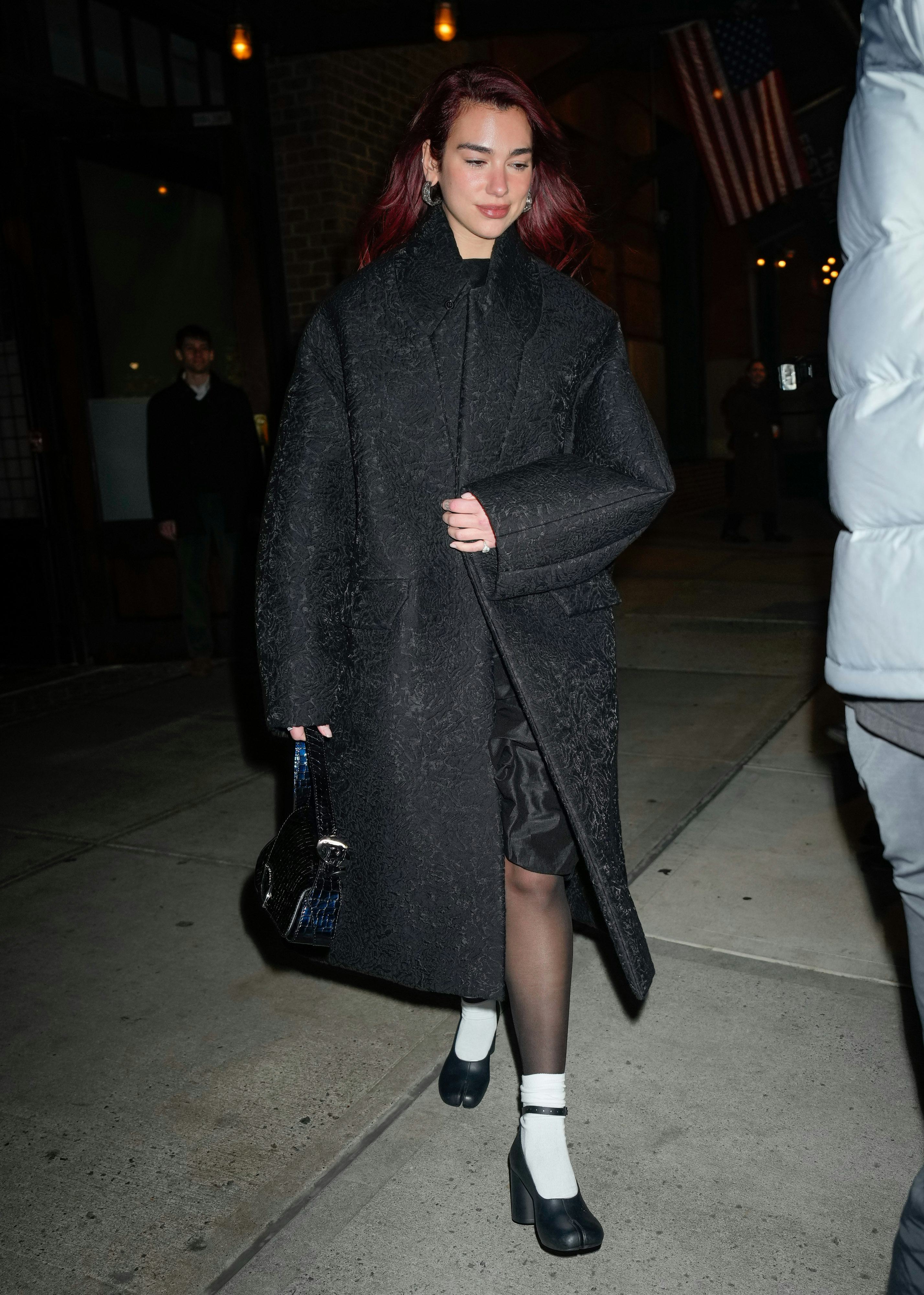 Dua Lipa wore ankle-strap Maison Margiela Tabi pumps