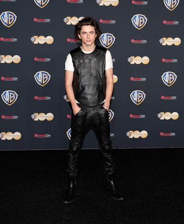 Timothee Chalamet poses for photos as he promotes the upcoming film "Dune: Part Two" during the Warn...