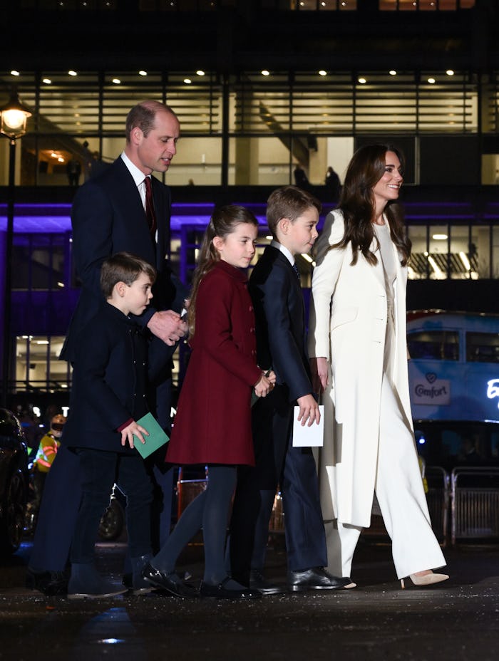 LONDON, ENGLAND - DECEMBER 08: Prince William, Prince of Wales, Prince Louis of Wales, Princess Char...