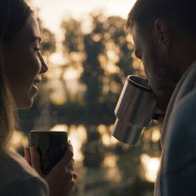 A couple drinking coffee.