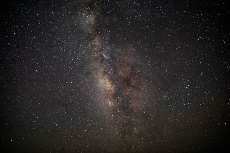 12 August 2023, Egypt, Faiyum: The Milky Way galaxy appears in the sky above the natural reserve are...