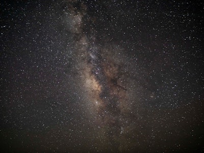 12 August 2023, Egypt, Faiyum: The Milky Way galaxy appears in the sky above the natural reserve are...